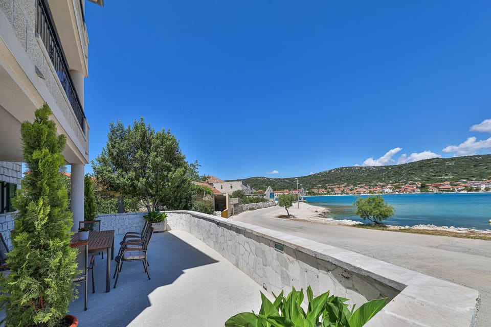 Sunlit terrace above the bay