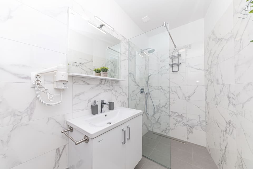 Marble rain-shower bathroom